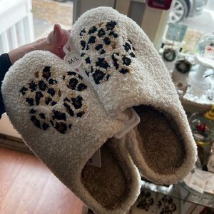 Leopard paw print slippers.  Size S/M which is a 6/7.  New with tags.